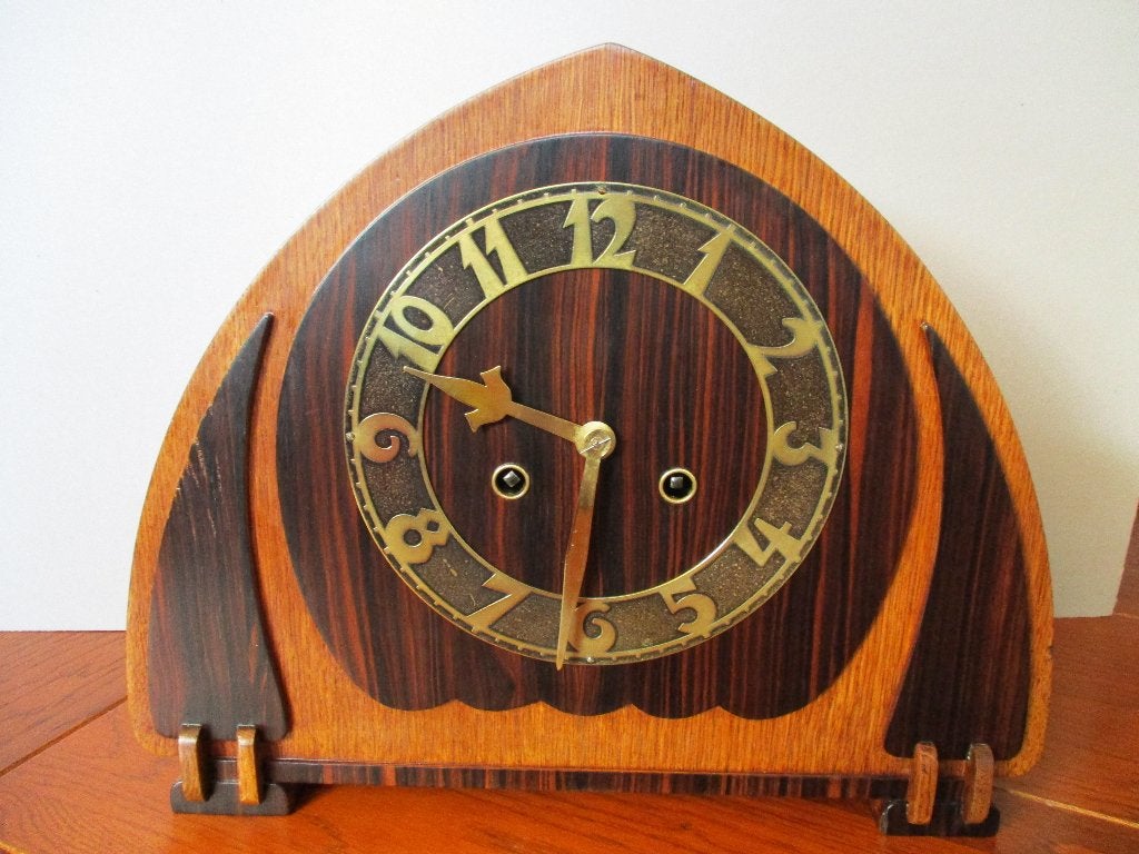 Mooie Mauthe Amsterdamse School klok, Ophalen