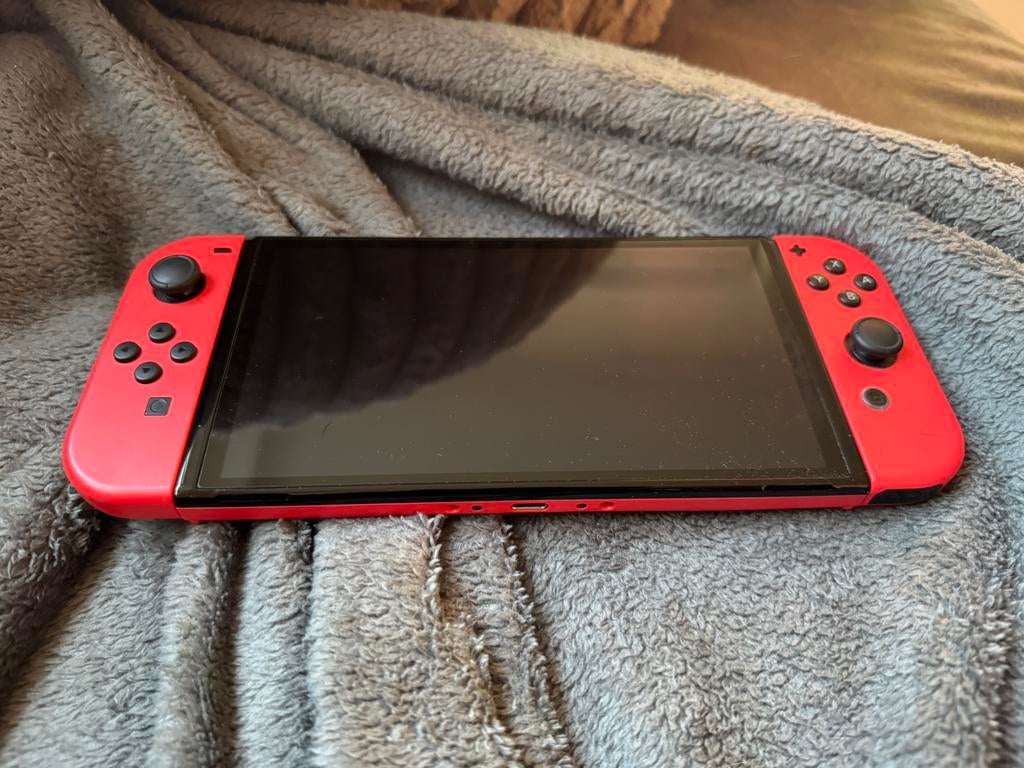 Nitendo switch oled super mario, Spelcomputers en Games, Spelcomputers | Nintendo Switch, Ophalen of Verzenden, Zo goed als nieuw