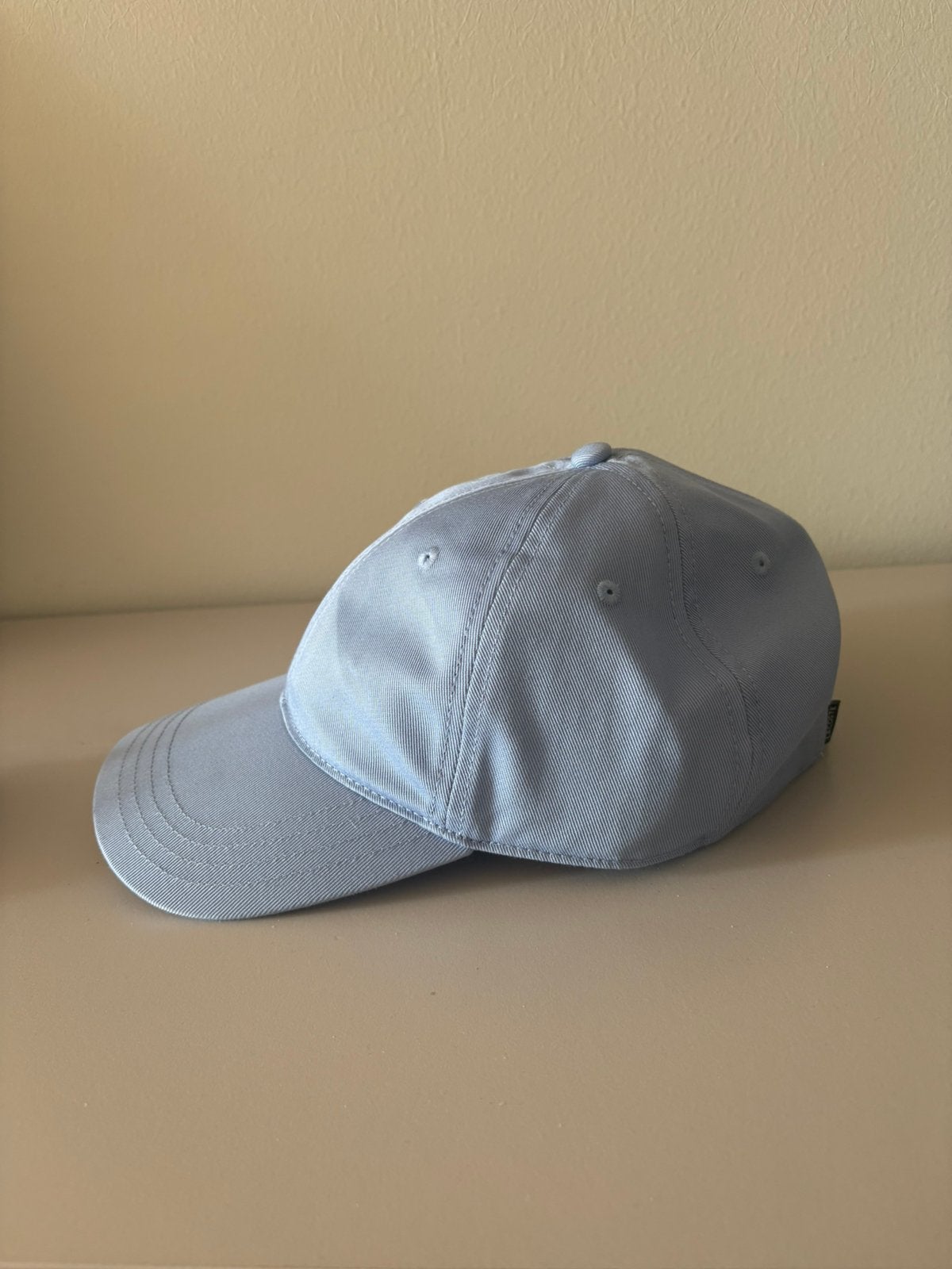 Lacoste pet. (Ongedragen)lichtblauw, Ophalen of Verzenden, Zo goed als nieuw