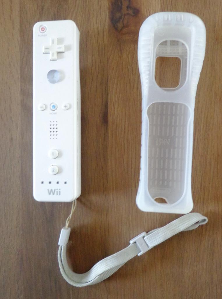 Remote controller wit + polsbandje + siliconen hoesje, Spelcomputers en Games, Spelcomputers | Nintendo Wii, Zo goed als nieuw