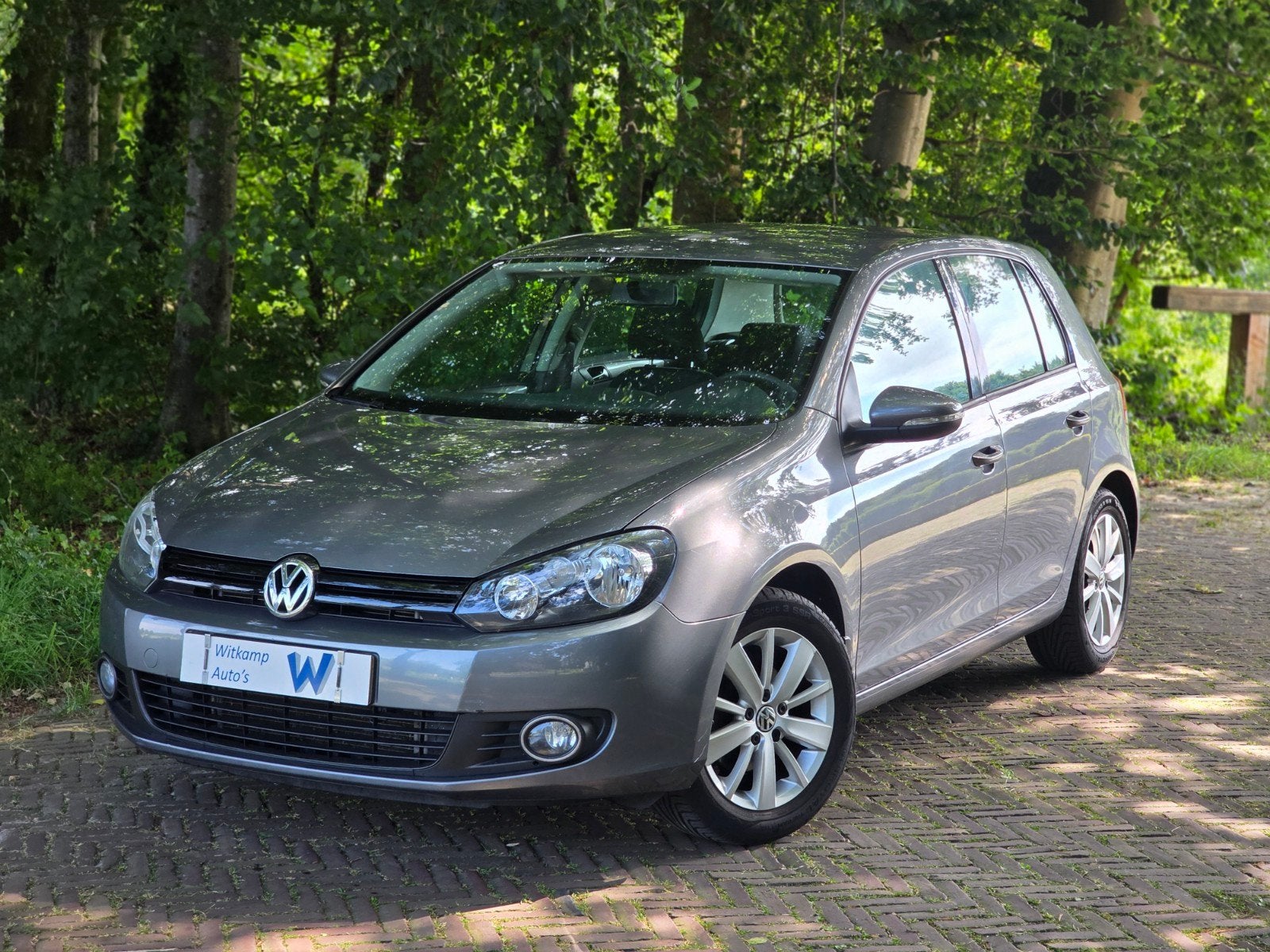 Volkswagen Golf 1.2 TSI | 1e eig | zeer weinig km | trekhaak, Voorwielaandrijving, Euro 5, Stof, Zwart