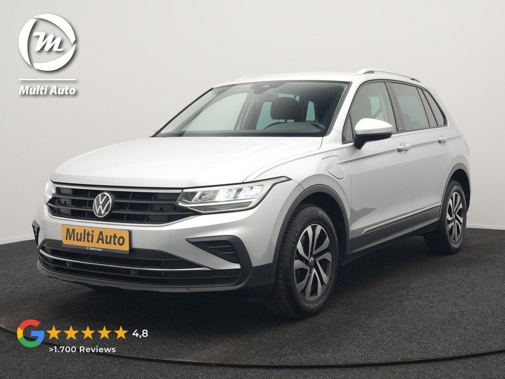 Volkswagen Tiguan 1.4 TSI eHybrid Active PHEV 245pk Dealer O, Auto's, Volkswagen, 1716 kg, Stof, Zwart, 4 cilinders