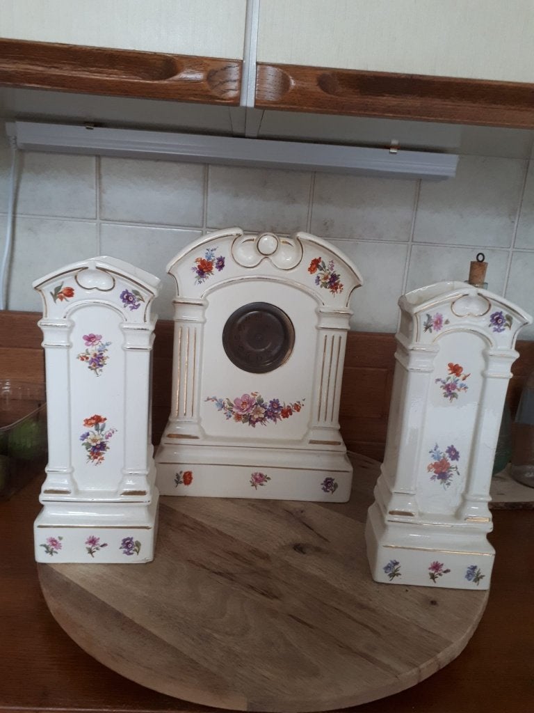 Antieke porseleinen klok met bloemmotief, Ophalen