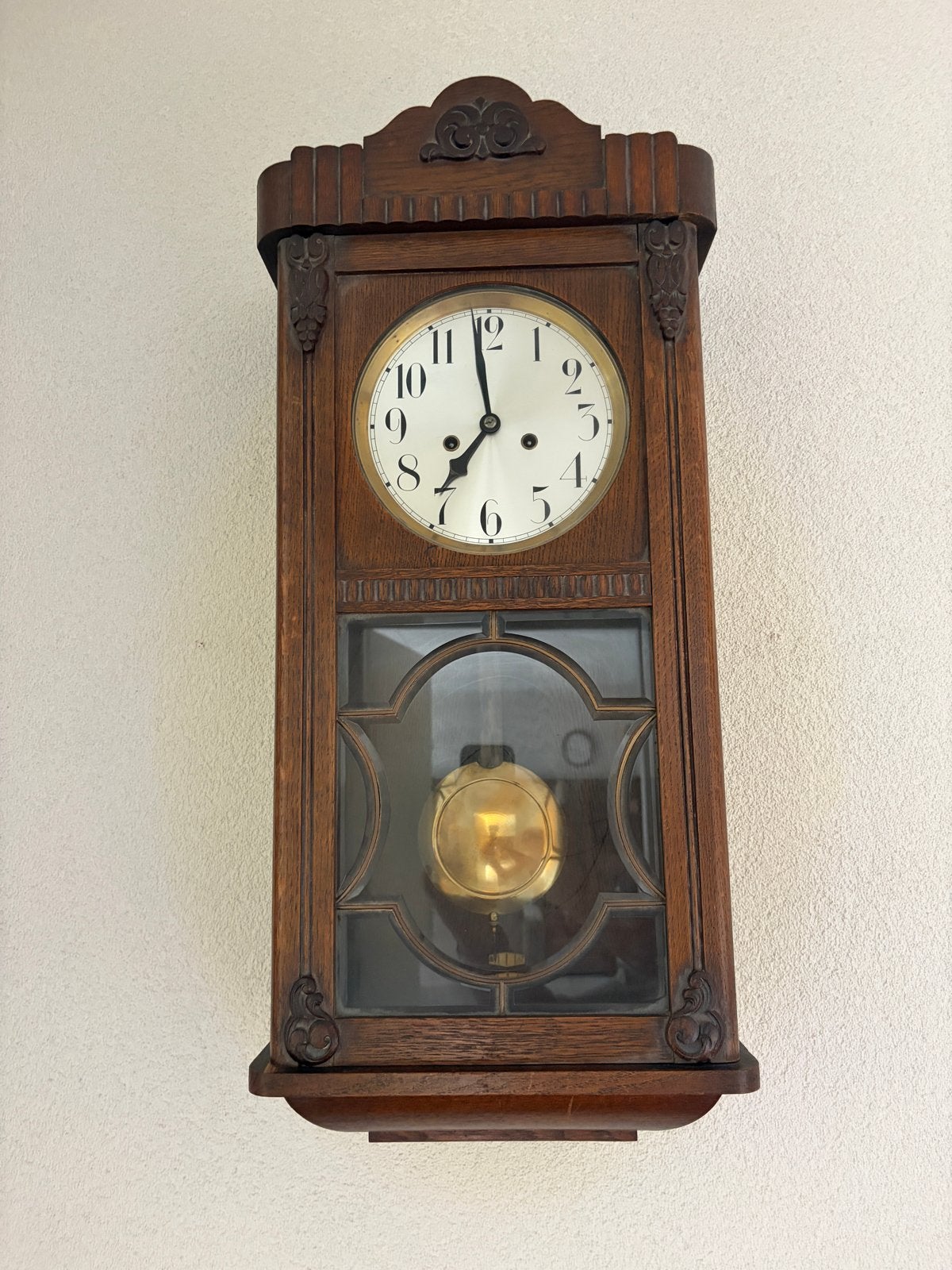 Antieke houten wandklok met slinger, Ophalen