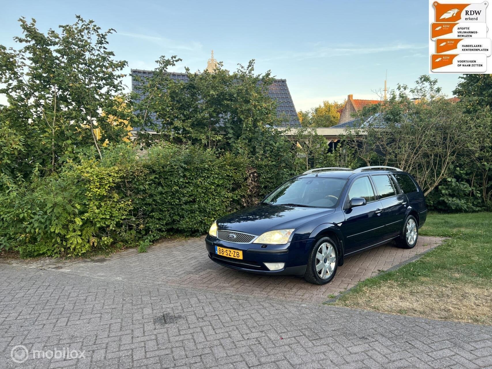 Ford Mondeo Wagon 2.0-16V Ghia Executive bj 2004, Voorwielaandrijving, 145 pk, 4 cilinders, Blauw