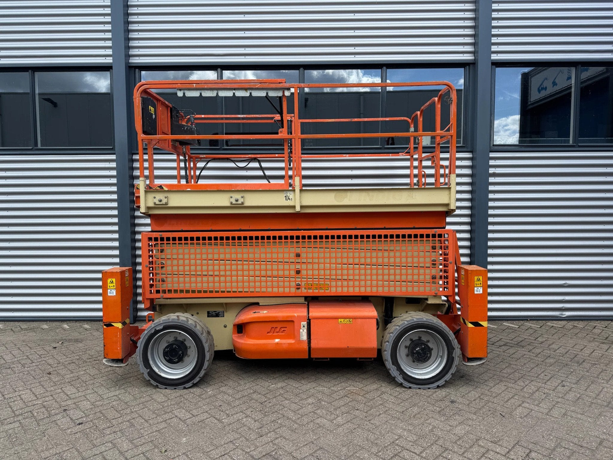 JLG M4069LE Hoogwerker Schaarhoogwerker Hybride (2008), Zakelijke goederen