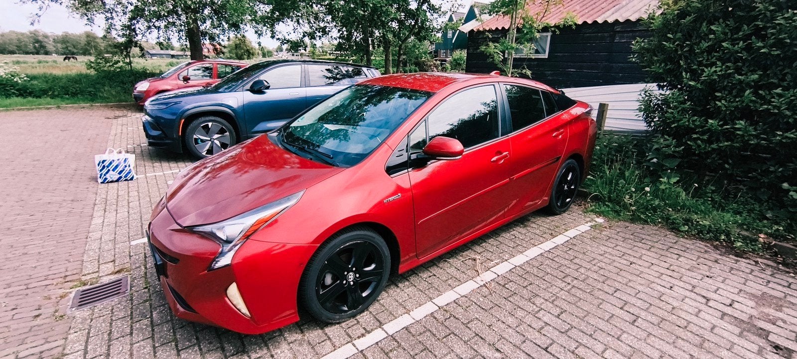 Toyota Prius 2016 Rood trekhaak android auto/apple CarPlay, Auto's, Toyota, Euro 5, Zwart, Prius, Electronic Stability Program (ESP)