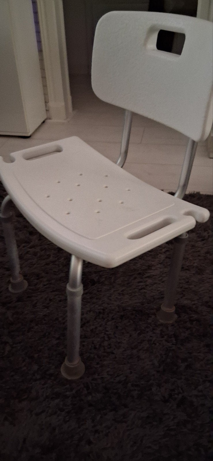 Te koop douchestoel, Ophalen