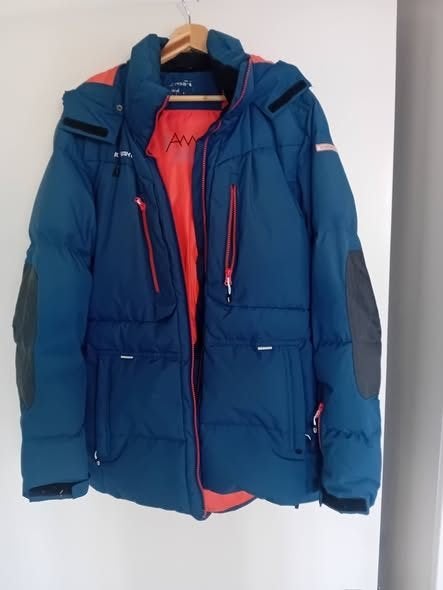 Prachtige heren ski jas . Blauw /oranje maat XL, Ophalen, Gedragen, Maat 56/58 (XL), Blauw