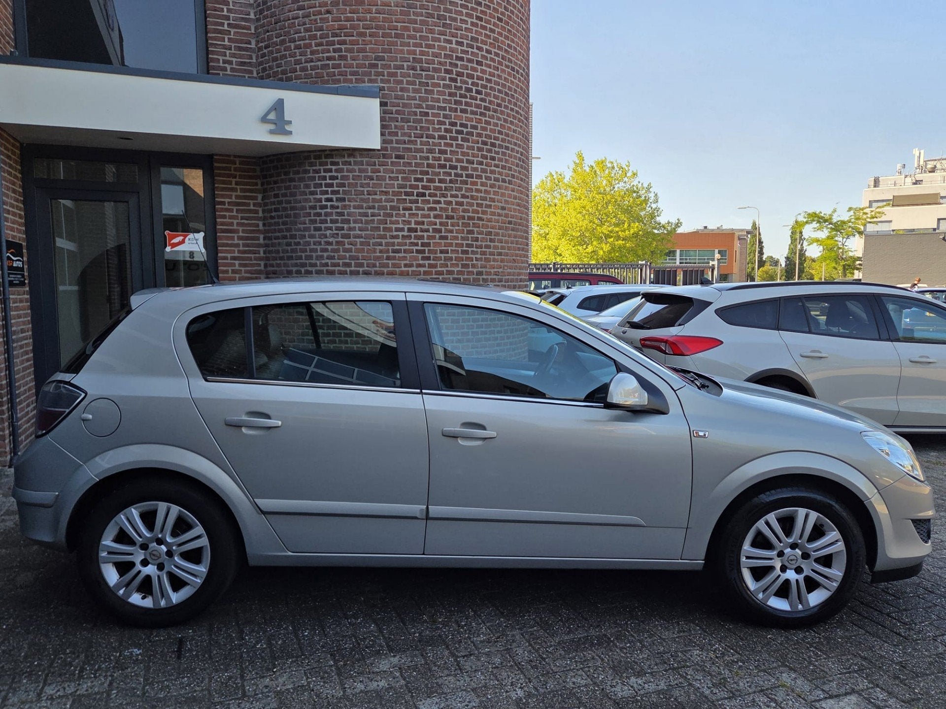 Opel Astra 1.6 Cosmo | Cruise | Clima | Leer | LM Velgen |, Auto's, Voorwielaandrijving, 15 km/l, Gebruikt, 4 cilinders