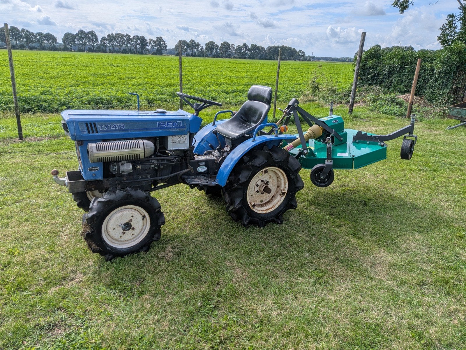 Nette Iseki TX1410 4WD Compacttractor +  FM100 weidebloter, Gebruikt, Tot 2500, Tot 80 Pk, Ophalen