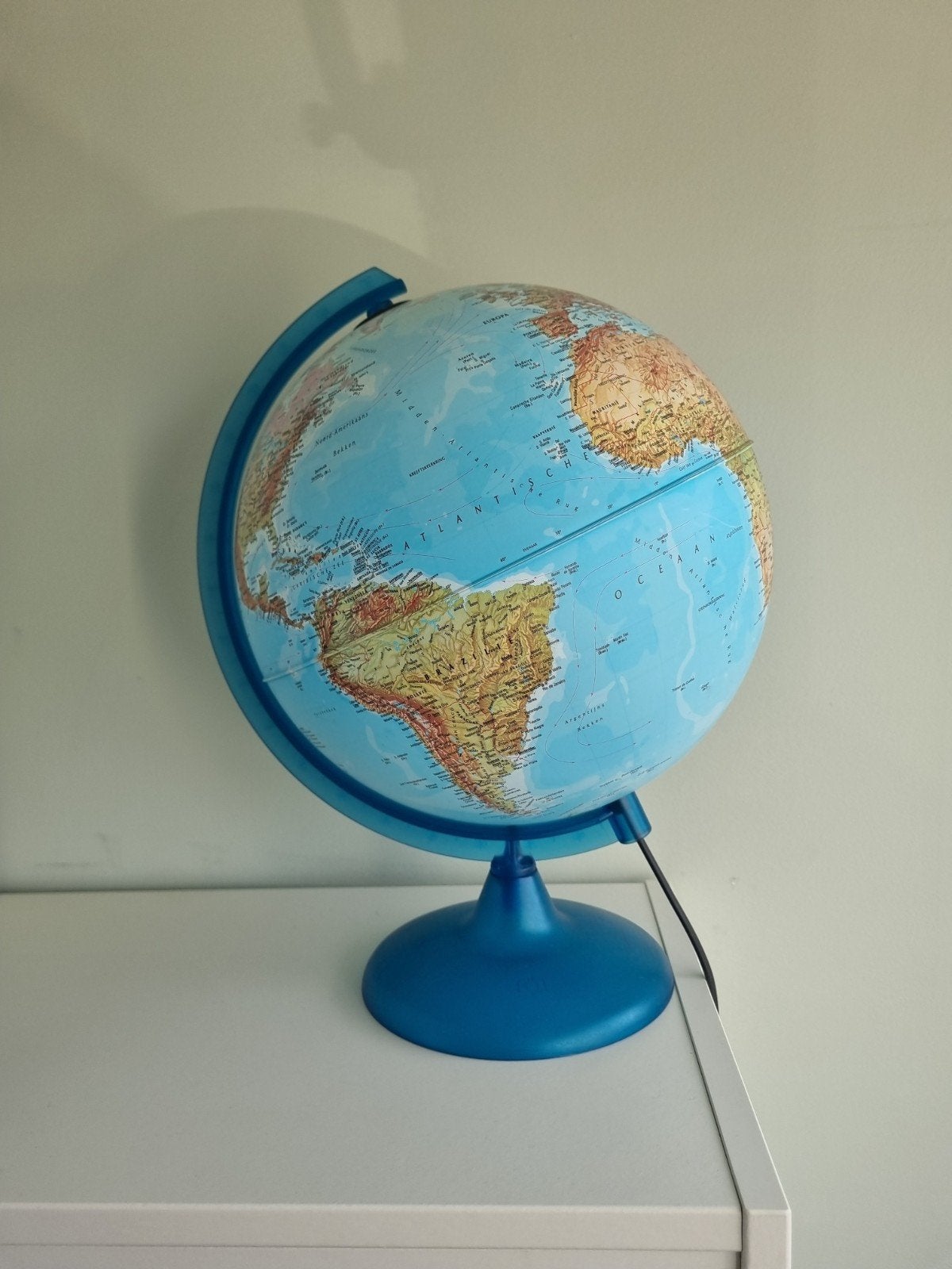 Wereld bol lamp, Ophalen, Zo goed als nieuw