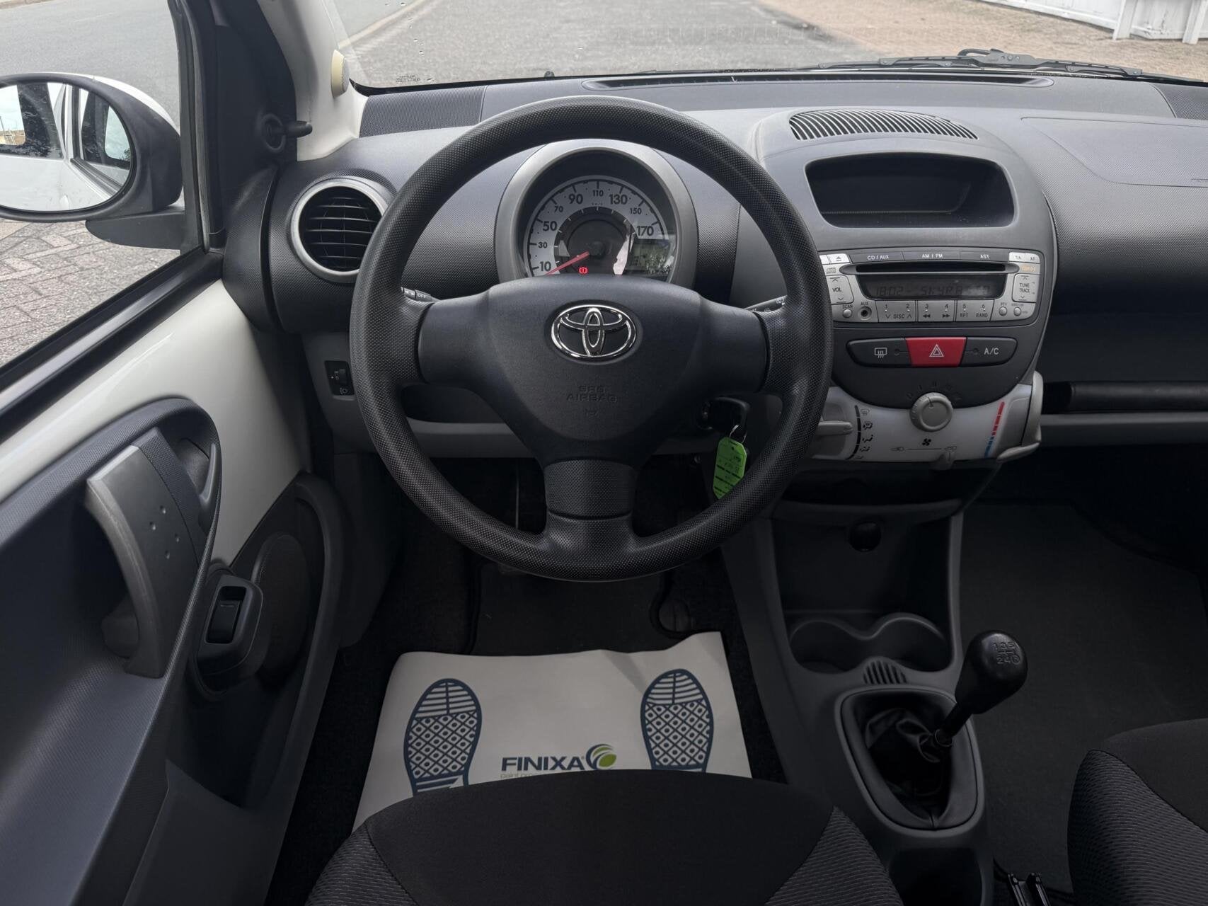 Toyota Aygo 1.0-12V + - 5DEURS/AIRCO/ELEK.RAMEN/NAP, Auto's, Voorwielaandrijving, Gebruikt, 4 stoelen, Origineel Nederlands