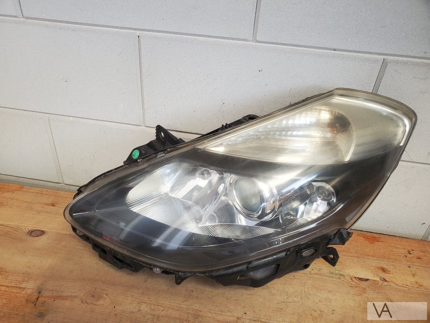 Renault Clio 3 facelift koplamp links 2009 - 2013 beetje dof, Gebruikt, -, Renault, -