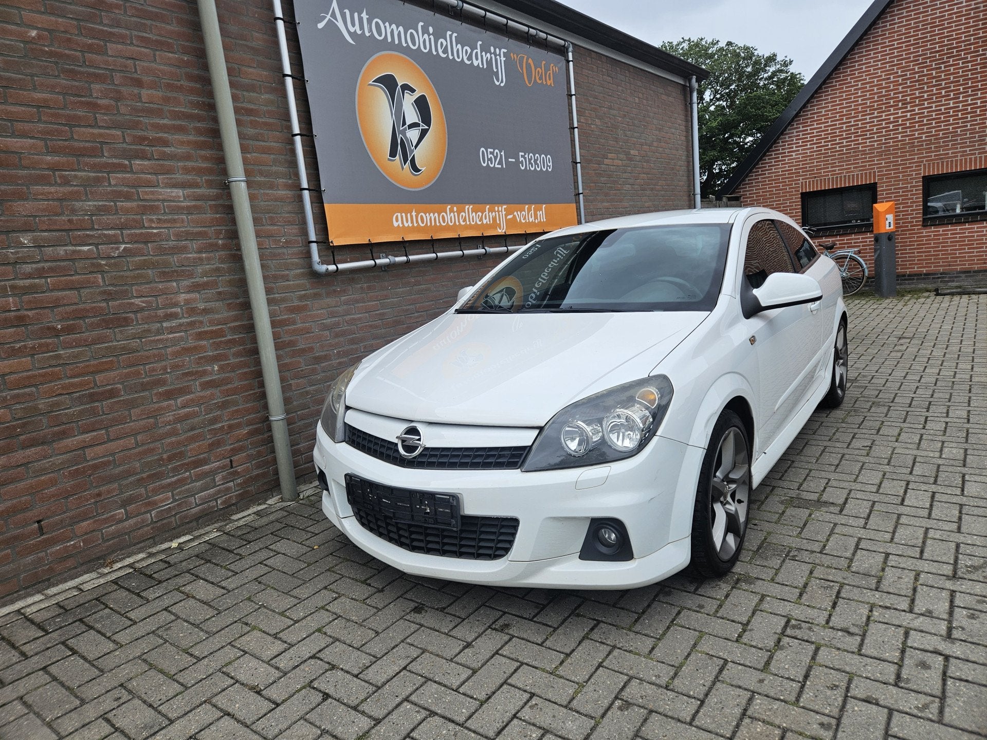 Opel Astra 1.6 opc-line (bj 2010), Auto's, Metallic lak, Gebruikt, Zwart, Leder en Stof