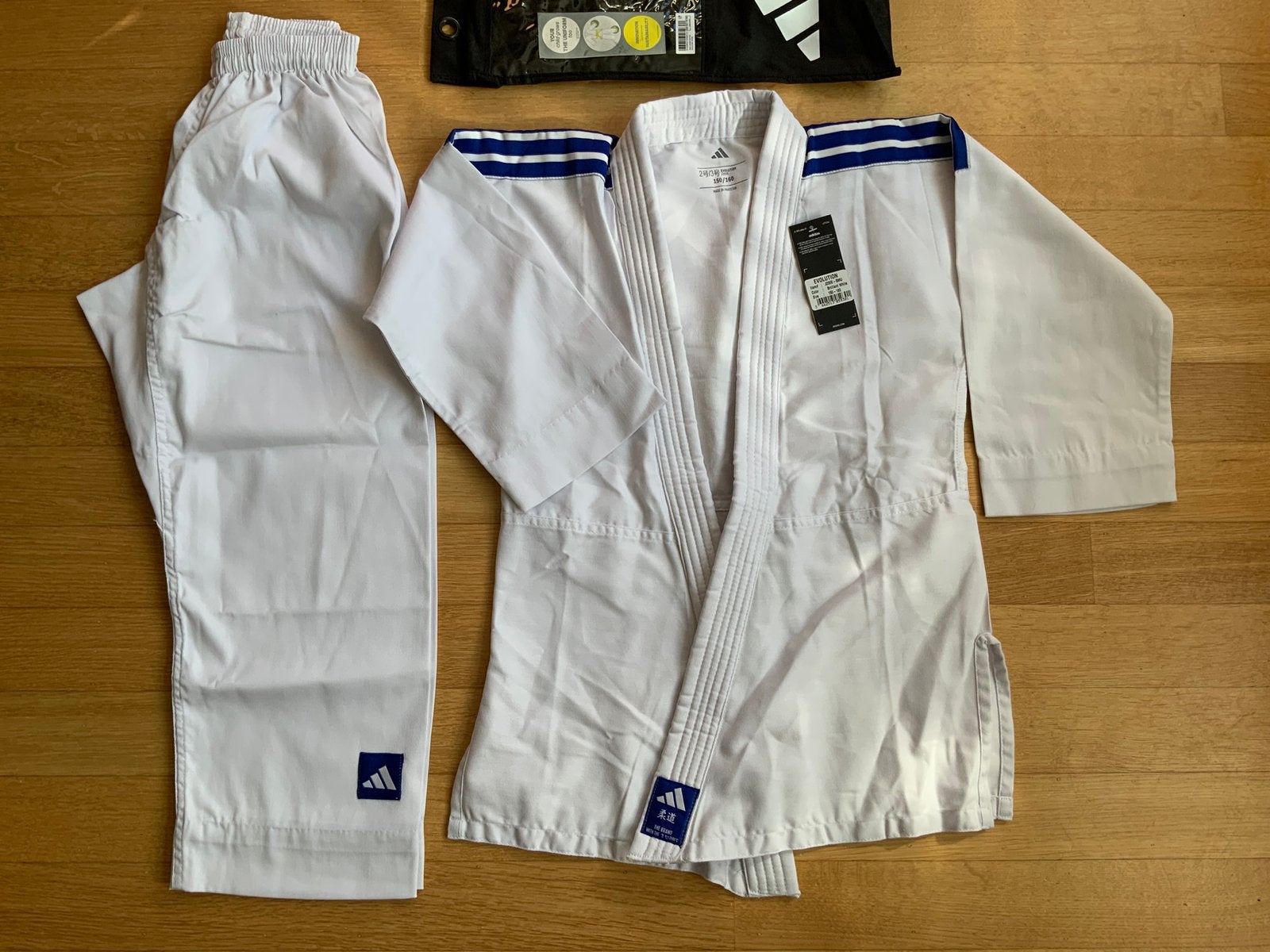 Judopak Adidas Evolution Meegroeimaat 150-160 Wit Nieuw, Ophalen of Verzenden, Nieuw, Judo, Vechtsportpak