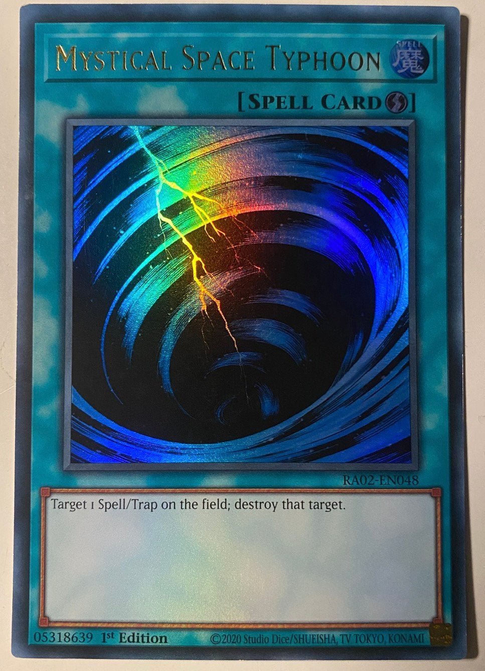 Yu-Gi-Oh! Mystical Space Typhoon RA02 1st Edition !, Ophalen of Verzenden, Zo goed als nieuw, Losse kaart, Foil