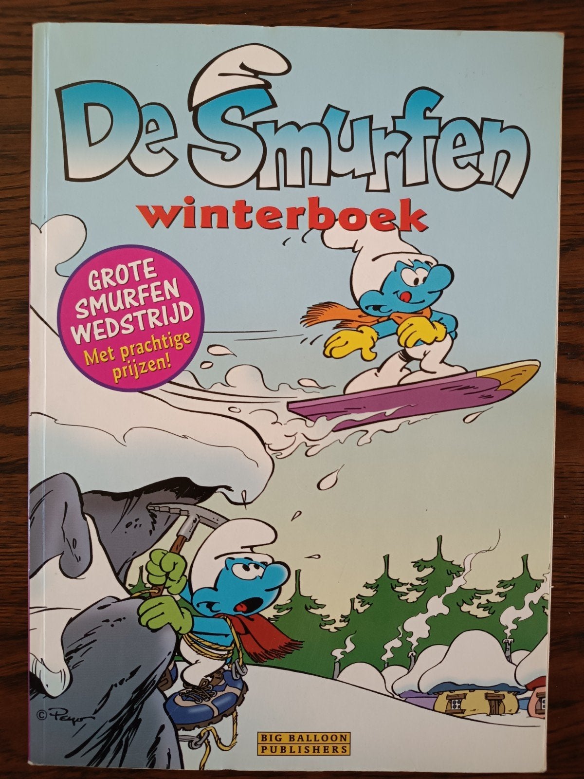 De Smurfen Winterboek - Strips en Spelletjes (1999), Boeken, Stripboeken, Gelezen, Peyo, Eén stripboek, Ophalen of Verzenden