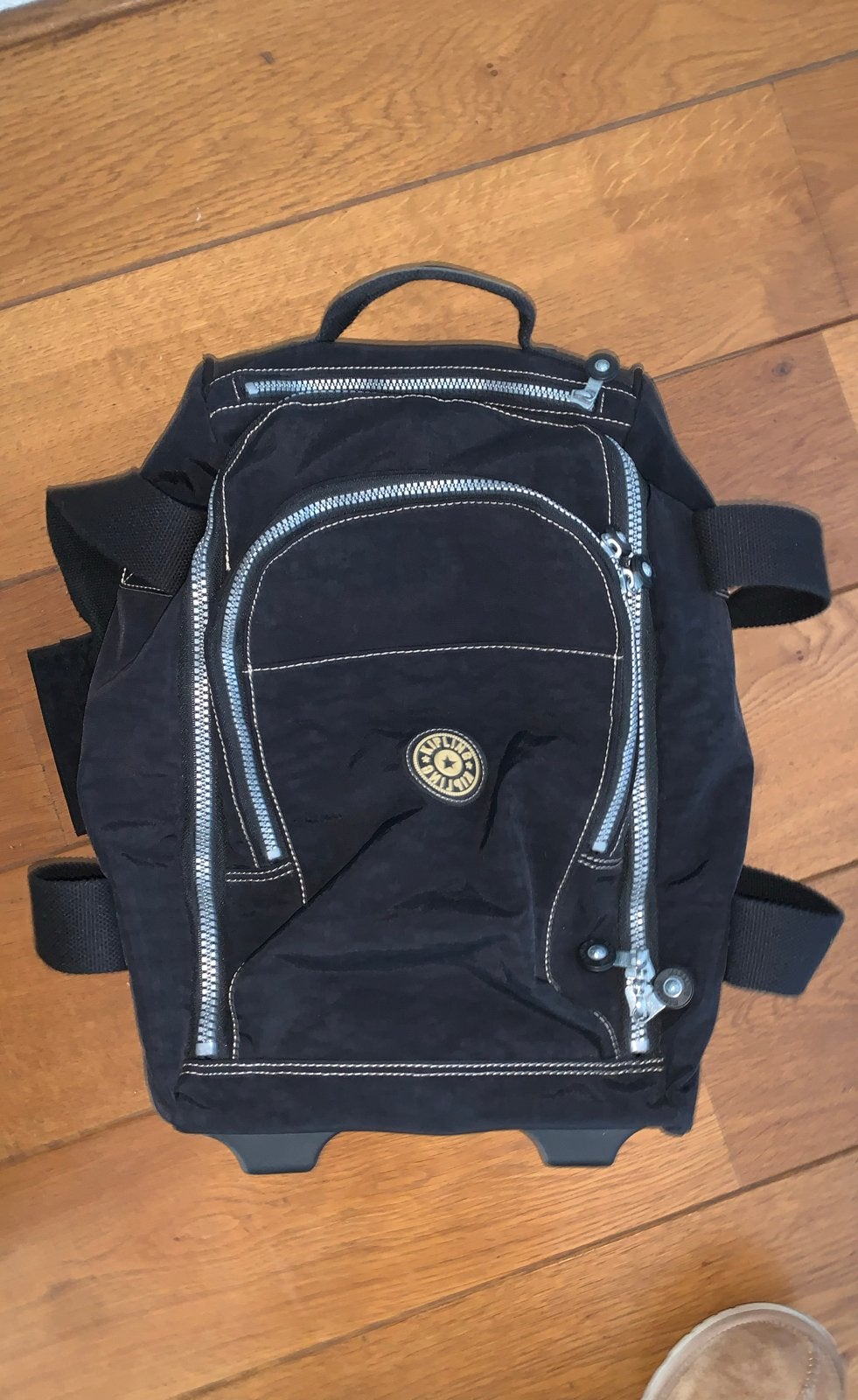 Kipling rugzak/ handbagage met wieltjes - Zwart, Ophalen of Verzenden, Zo goed als nieuw, Minder dan 25 cm, Kipling