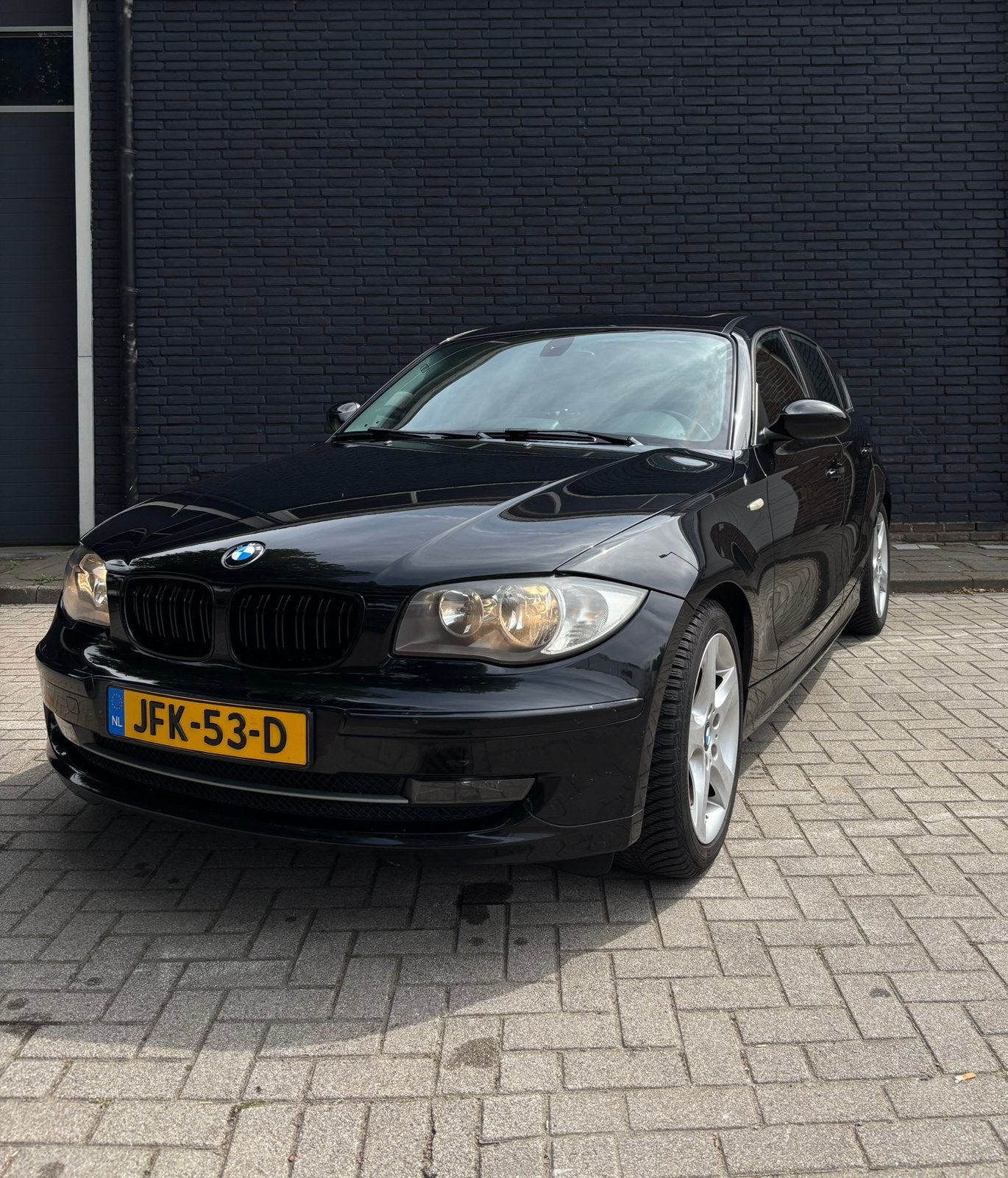 BMW 1-Serie 1.6 116I 5DR 2009 Zwart, 1-Serie, Dealer onderhouden, Achterwielaandrijving, 4 cilinders
