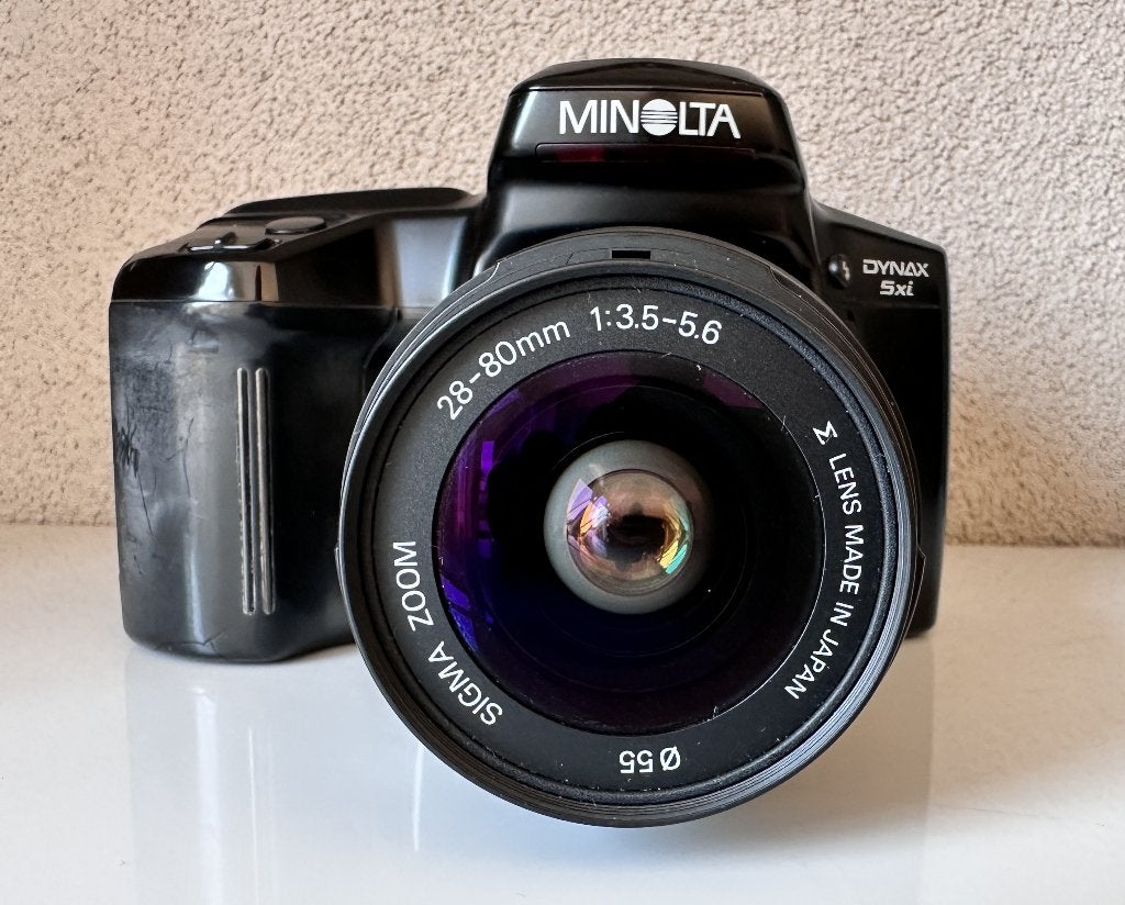 Prima Minolta Dynax 5xi analoge camera met zoomlens, Ophalen of Verzenden, Zo goed als nieuw, Spiegelreflex, Minolta