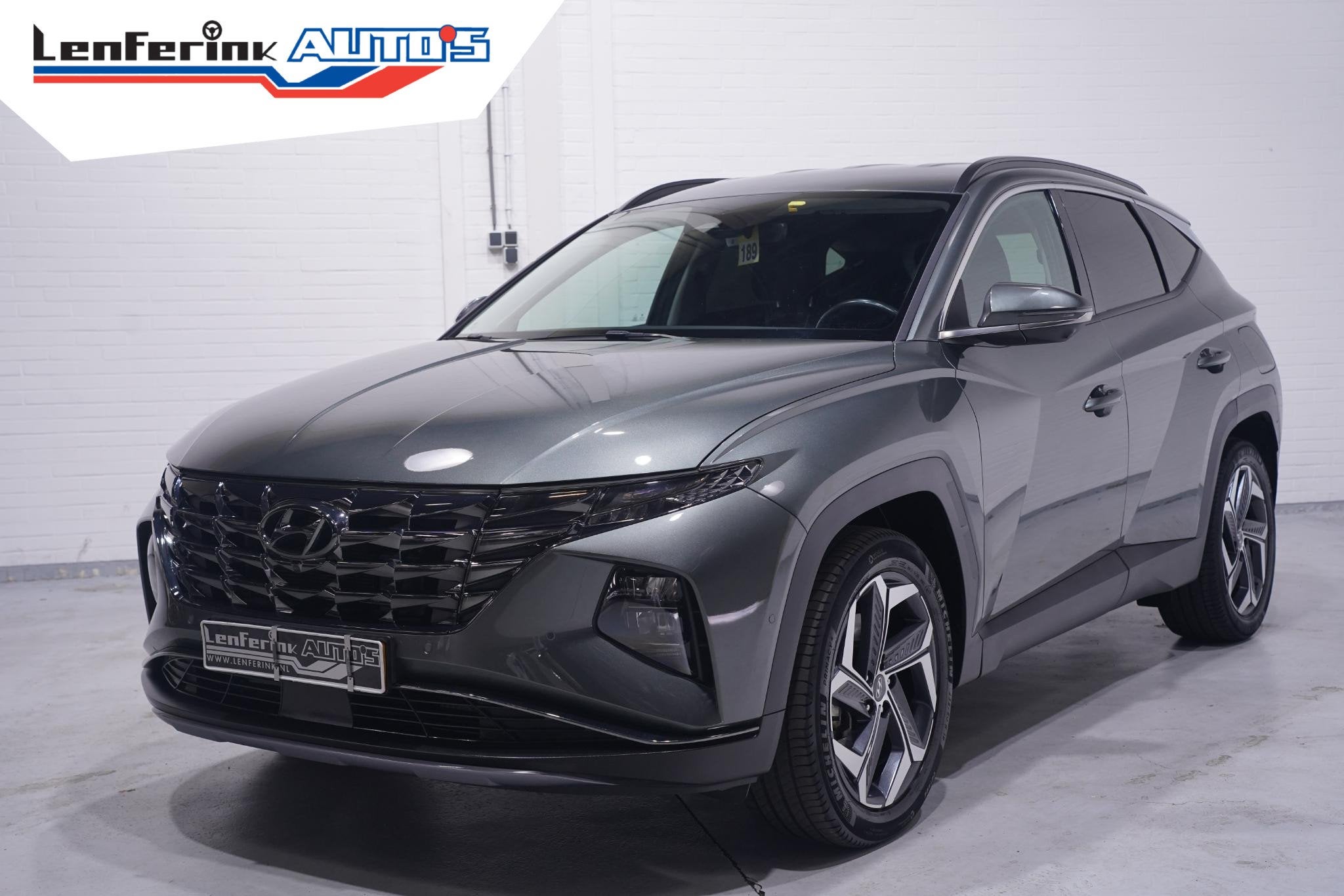 Hyundai Tucson 1.6 T-GDI HEV Premium 1e eign. NAP Navigatie, Auto's, Automatische klimaatregeling, Gebruikt, Euro 6, 4 cilinders