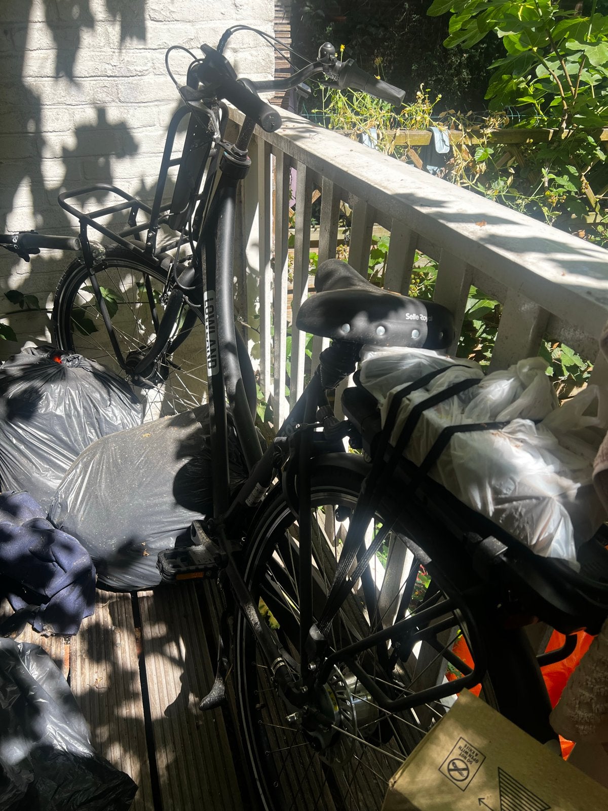 Lowland elektrische fiets met lader, slot, garantie en bon, Ophalen, Zo goed als nieuw