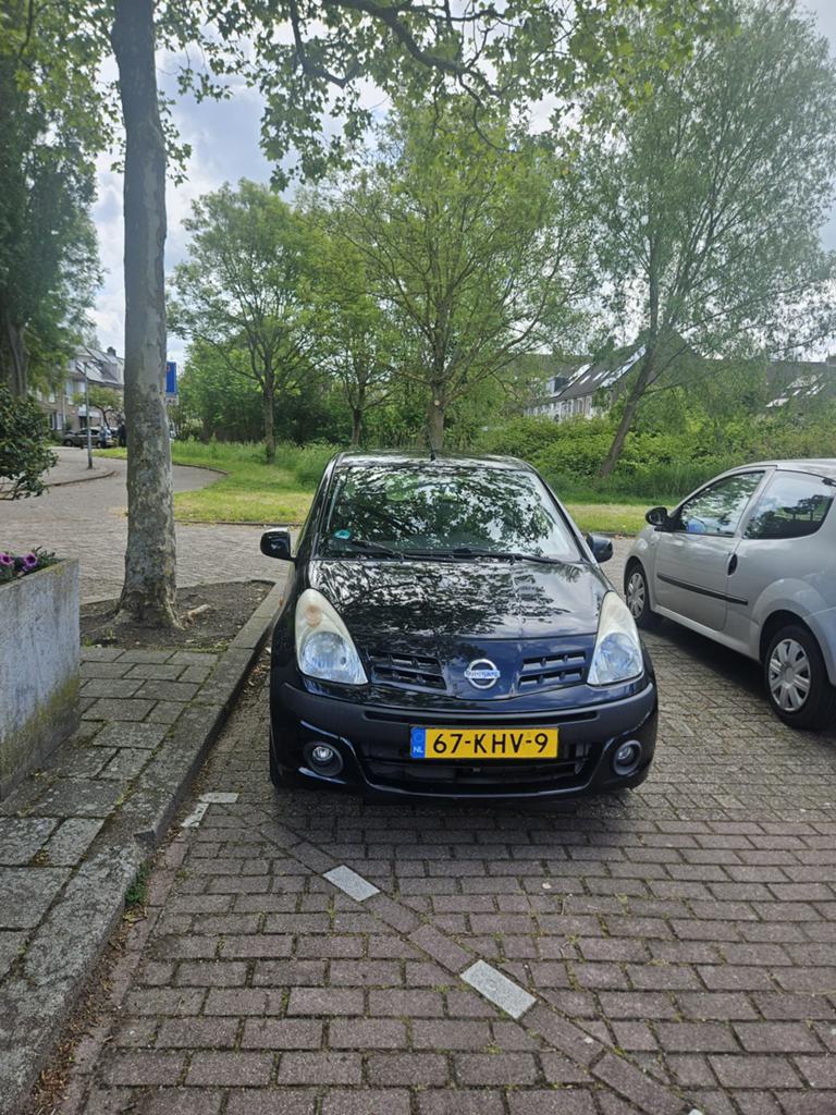 Nissan Pixo 1.0 50KW 5D 2009 Zwart, Auto's, Nissan, Voorwielaandrijving, 200 kg, 4 stoelen, Origineel Nederlands