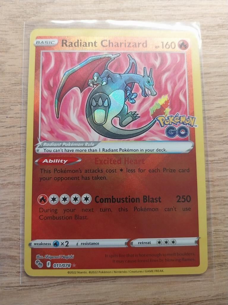Radiant Charizard, Hobby en Vrije tijd, Verzamelkaartspellen | Pokémon, Ophalen of Verzenden, Nieuw, Losse kaart, Foil