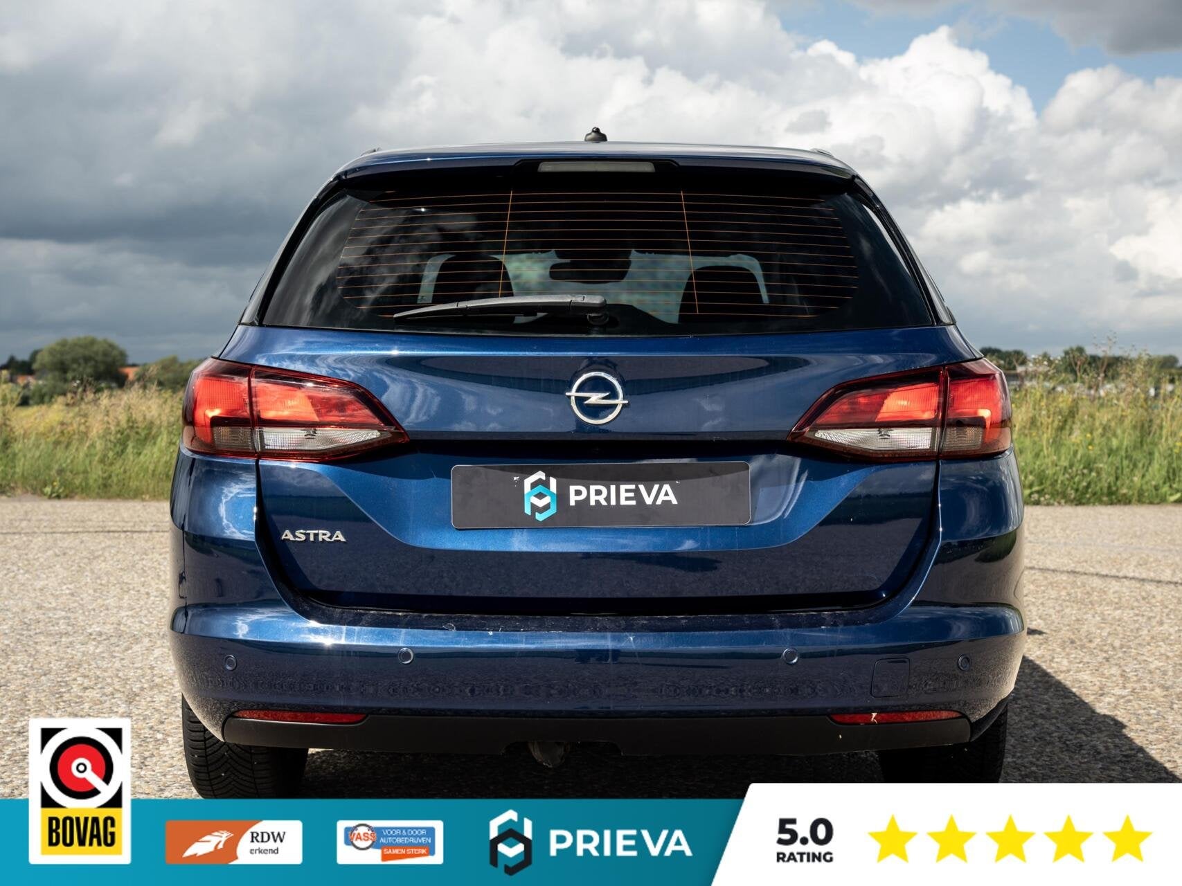 Opel Astra Sports Tourer 1.2 Turbo | Stoelverwarming | Deale, Auto's, Voorwielaandrijving, Dealer onderhouden, Stof, Gebruikt