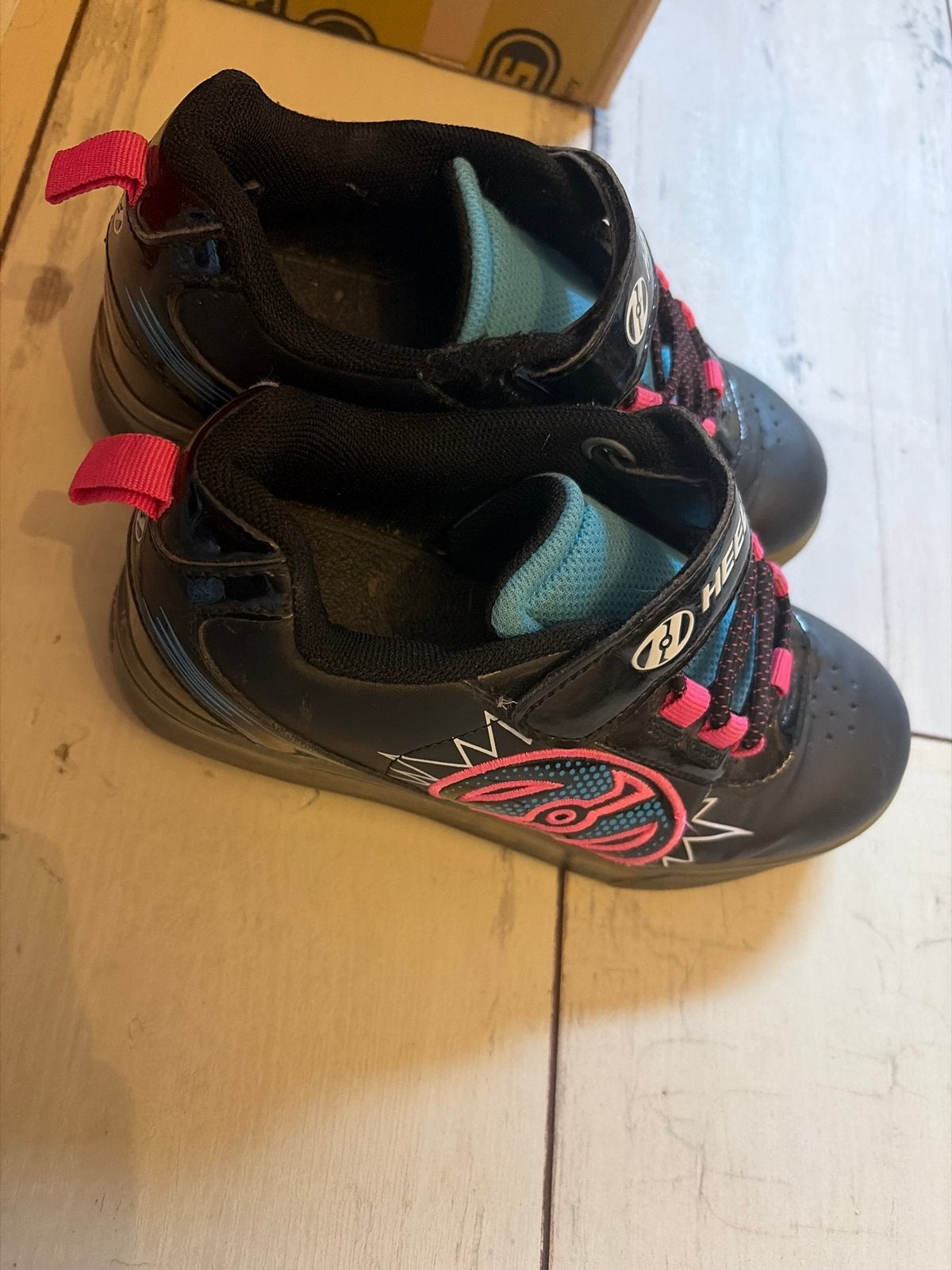 Heelys rolschoenen zwart met roze accenten maat 33, Ophalen of Verzenden, Gebruikt, Kinderen