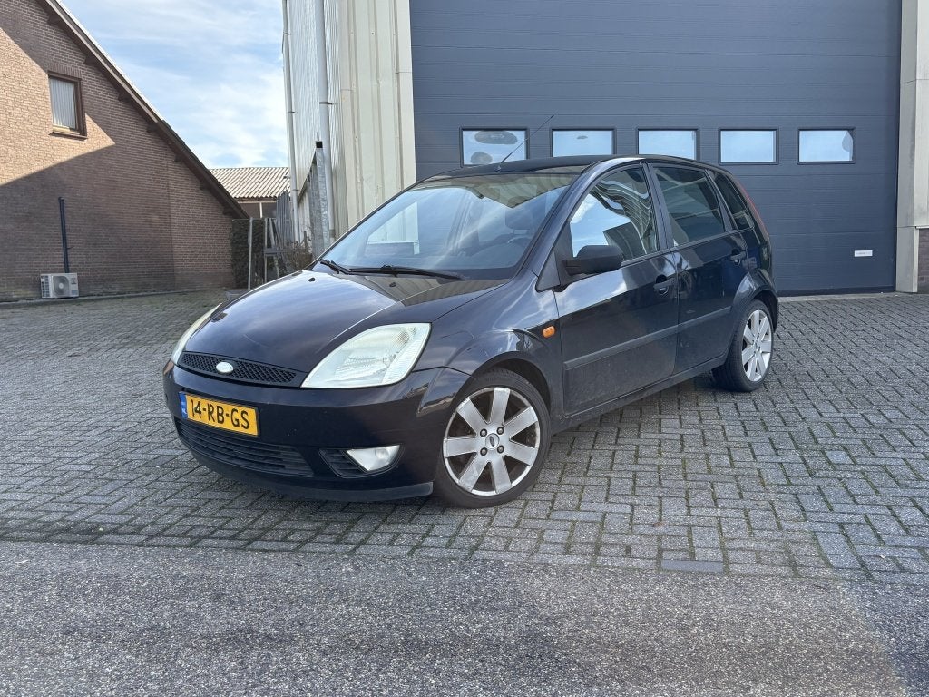 Ford Fiesta 1.6 Futura 5 deurs Airco ijskoud Org NL NAP Velg, 1596 cc, Zwart, Leder en Stof, Zwart