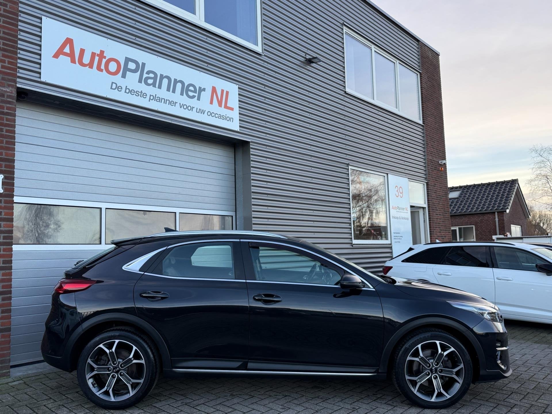 Kia XCeed 1.4 TGDI Spirit! Camera! Clima! Cruise! Navi!, Auto's, Kia, XCeed, Zwart, 4 cilinders, Leder en Stof