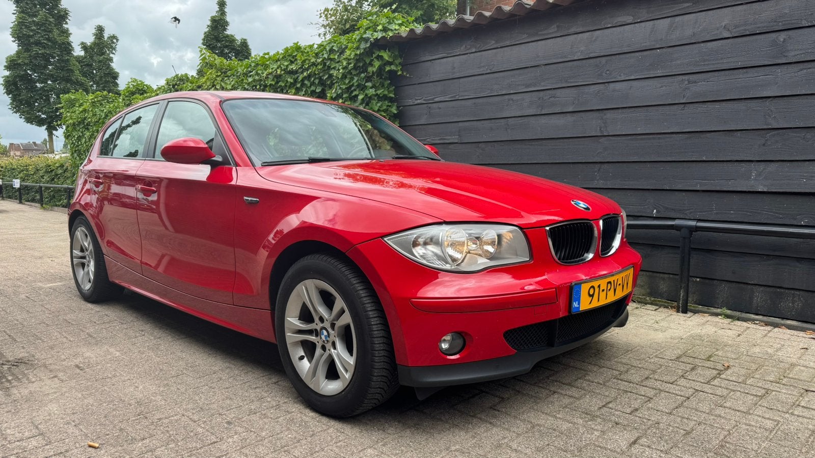 BMW 1-Serie 1.6 I high executive climatronic cruisecontrole, 1596 cc, Zwart, 4 cilinders, Origineel Nederlands