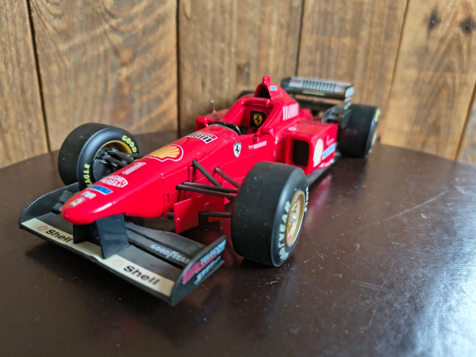 Ferrari F310 F1 Schumacher (1996) - 1:20 Maisto, Ophalen of Verzenden, Zo goed als nieuw, Auto, Bburago
