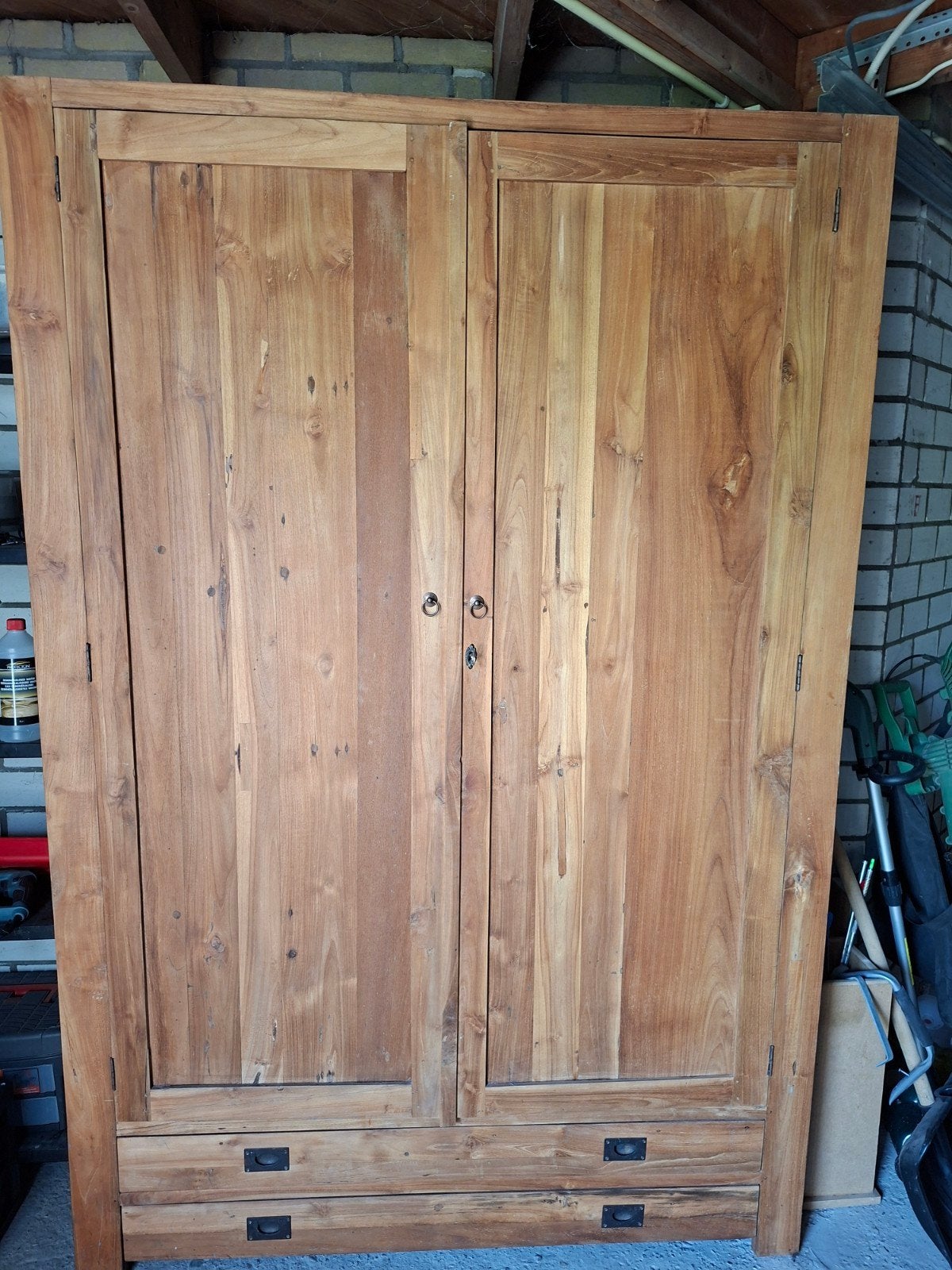 Teakhouten wandkast, Ophalen