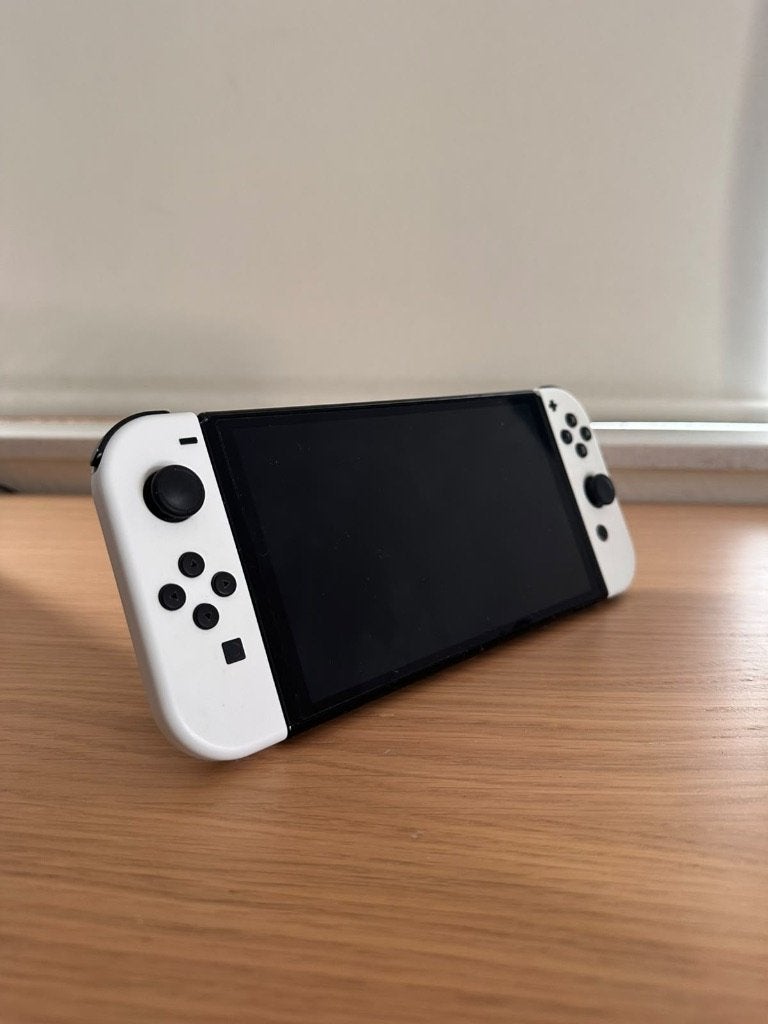 Nintendo Switch OLED, Ophalen of Verzenden, Zo goed als nieuw, Met 2 controllers, Switch OLED