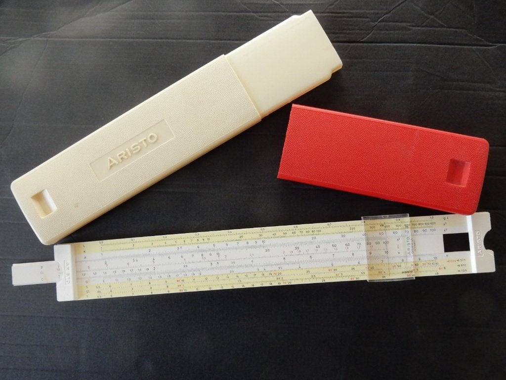 Aristo scholar LL 0903 rekenliniaal in originele koker, Antiek en Kunst, Ophalen of Verzenden