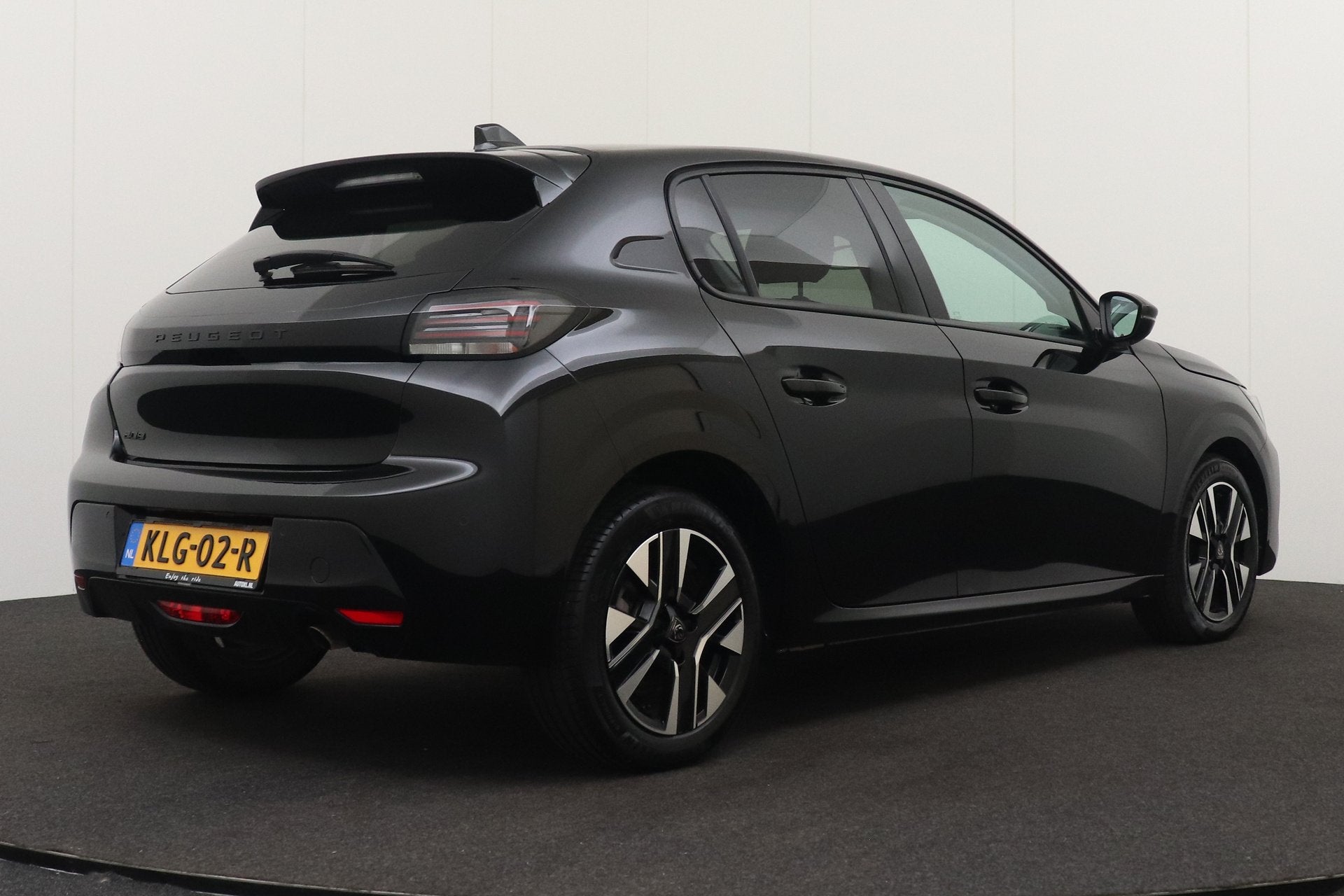 Peugeot 208 1.2T 101 PK Allure Half-Leder Carplay Privacy Gl, Auto's, Voorwielaandrijving, 101 pk, Gebruikt, Leder en Stof