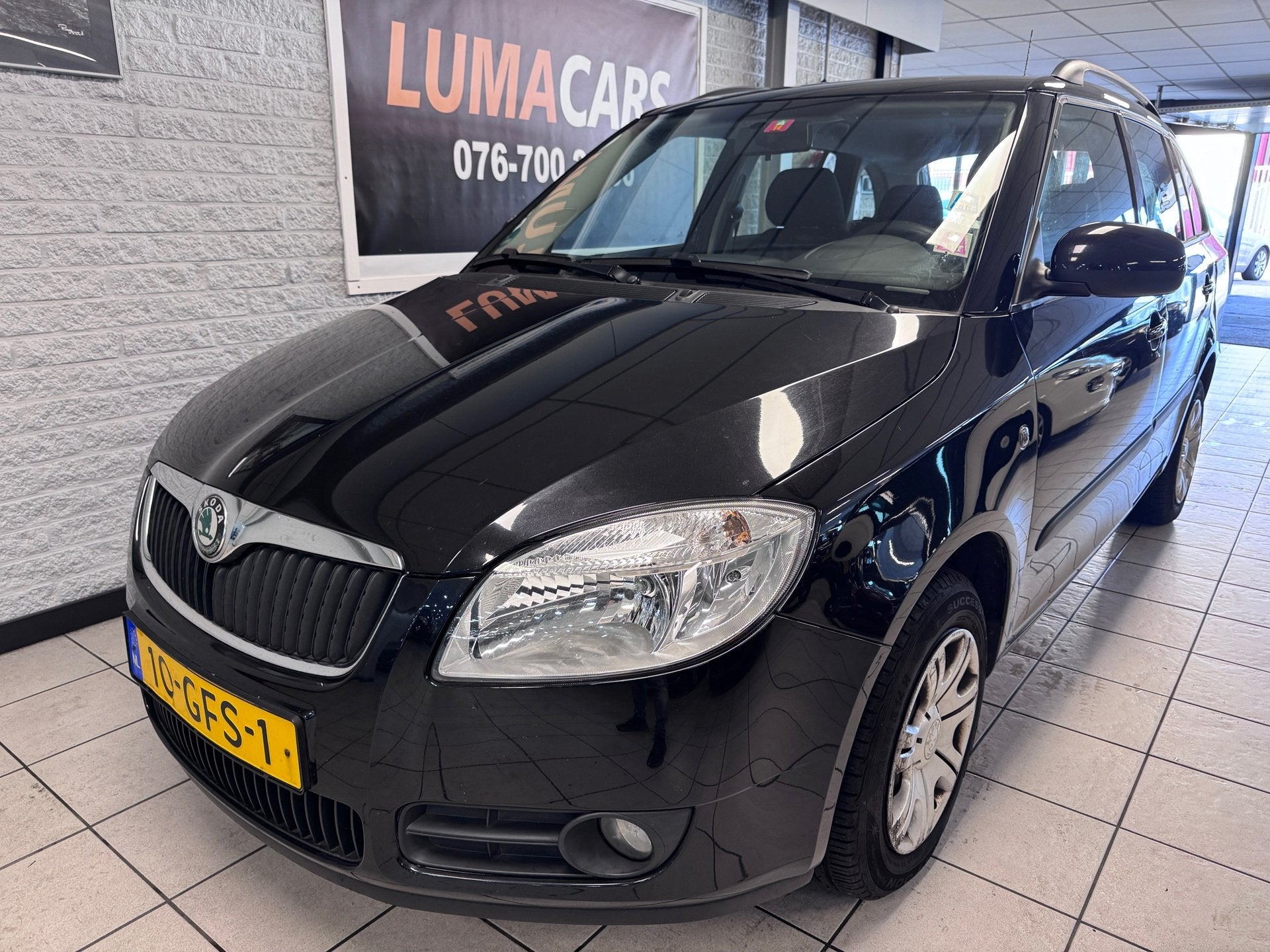 Skoda Fabia Combi 1.4-16V Ambiente | Nieuwe APK | Cruise |, Auto's, Voorwielaandrijving, 4 cilinders, Verwarmde buitenspiegels