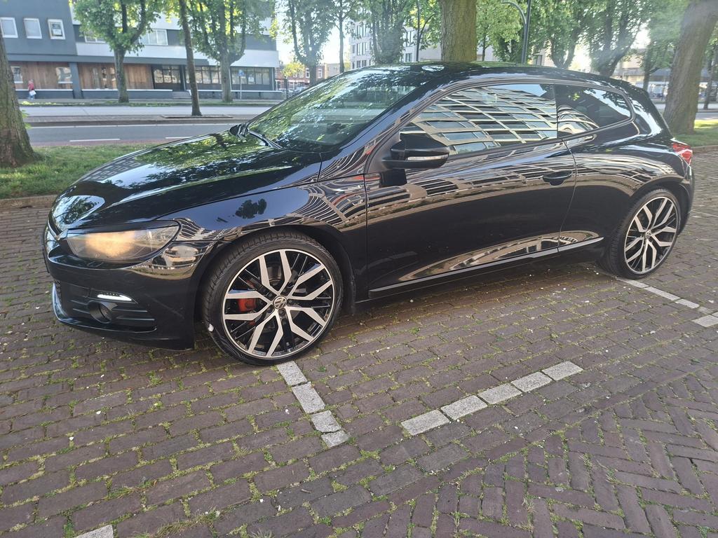 Volkswagen Scirocco 1.4 TSI 118KW DSG 2010 Zwart, Auto's, 4 cilinders, Zwart, Origineel Nederlands, Particulier