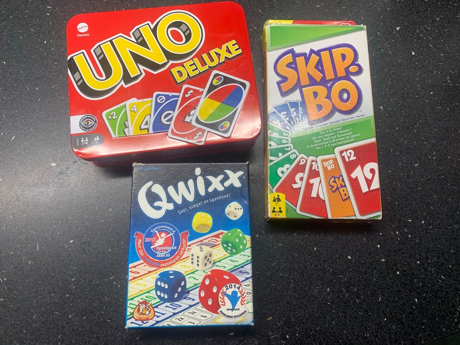 Bordspellen set: Qwixx, UNO Deluxe en Skip-Bo, Hobby en Vrije tijd, Een of twee spelers, Ophalen of Verzenden, Gebruikt