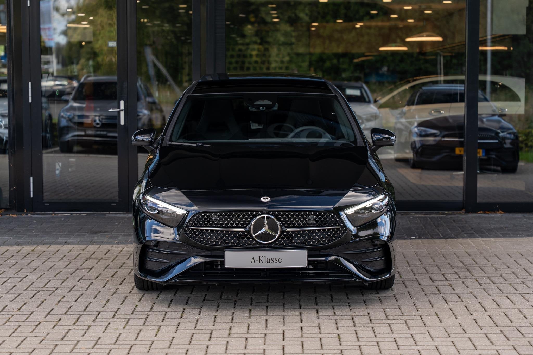 Mercedes-Benz A-klasse 180 Business Solution AMG | Panoramas, Auto's, 136 pk, 4 cilinders, Zwart, Origineel Nederlands