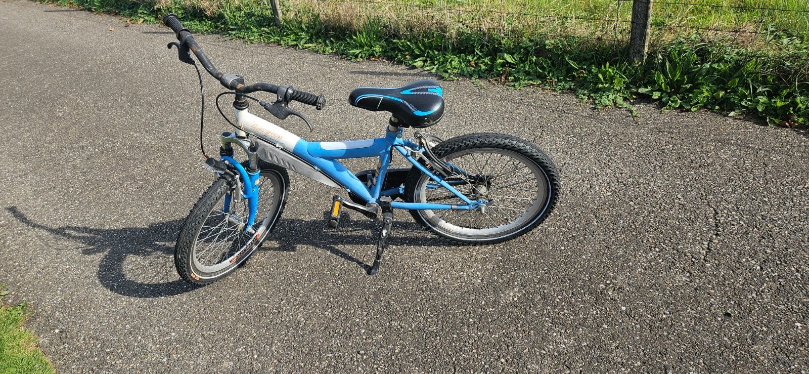 Lockie kinderfiets - Blauw/Wit - 20 inch, Ophalen, 20 inch of meer, Gebruikt, Velgrem