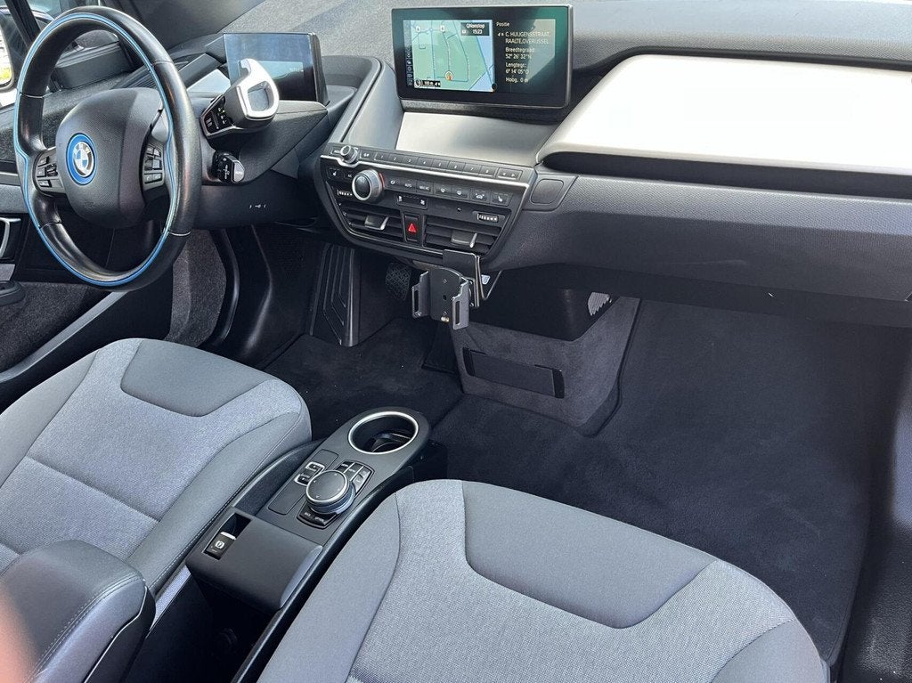 BMW i3 170PK 94Ah 33 kWh NL AUTO LED+GROOT SCHERM NAVI+PDC, Automaat, Gebruikt, Zwart, 33 kWh