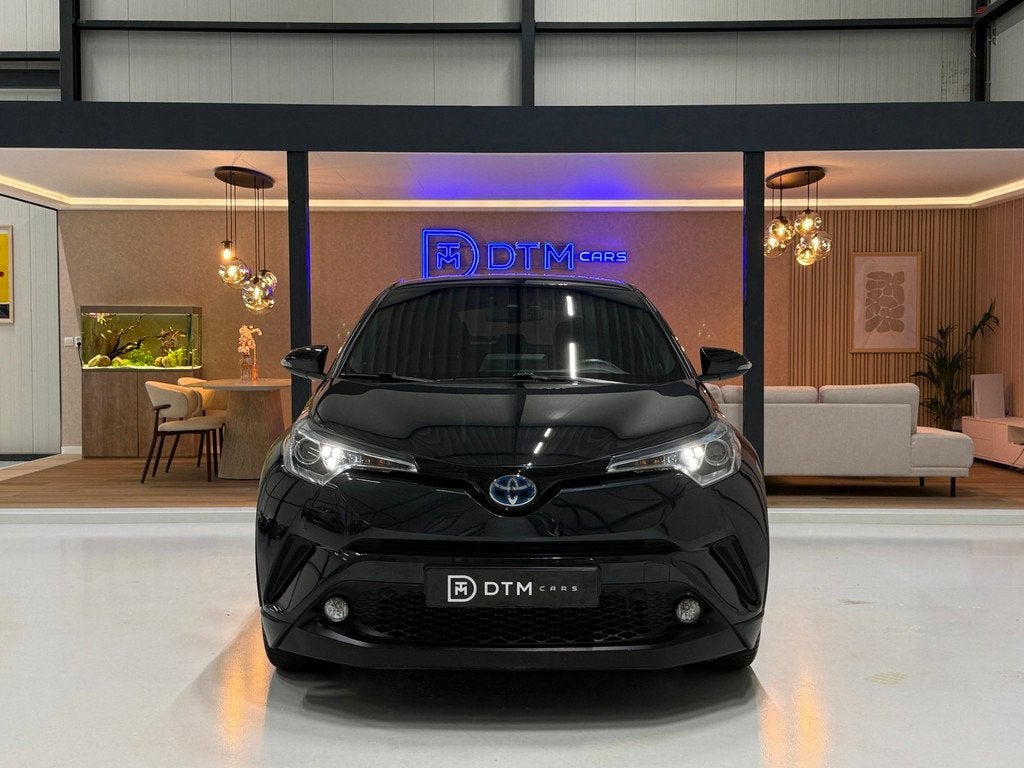 Toyota C-HR 1.8 Hybrid Executive Diamond | Trekhaak |Navigat, Auto's, Toyota, 4 cilinders, Leder en Stof, Zwart, Bedrijf