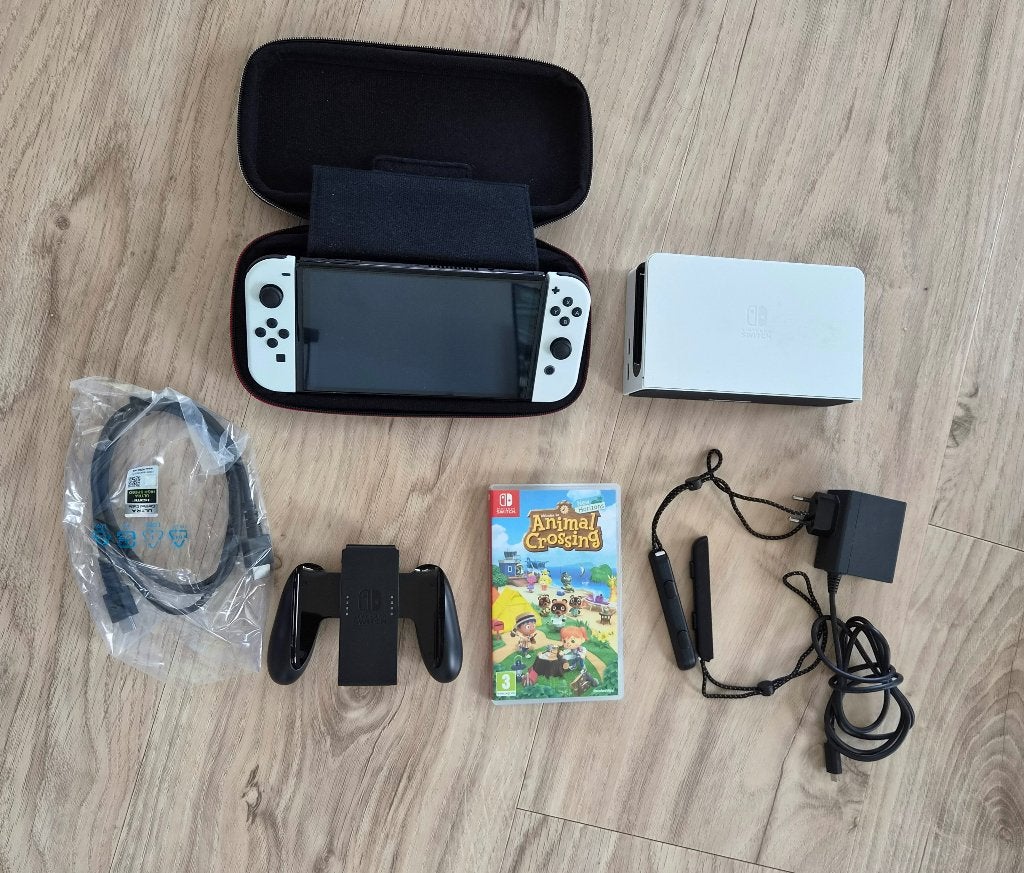 Nintendo Switch OLED + Animal Crossing, Met games, Met 2 controllers, Zo goed als nieuw, Switch OLED