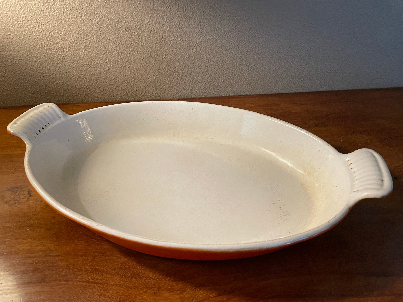 Le Creuset Ovenschaal Ovaal Oranje - Gebruikt - 32cm, Gebruikt, Gietijzer, Overige typen, Le Creuset