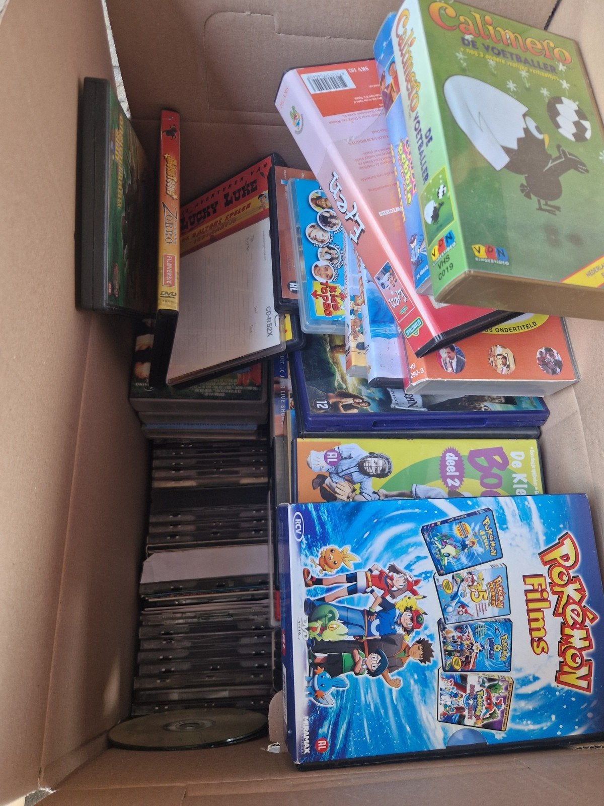 diverse cd', dvd's en videobanden, Ophalen
