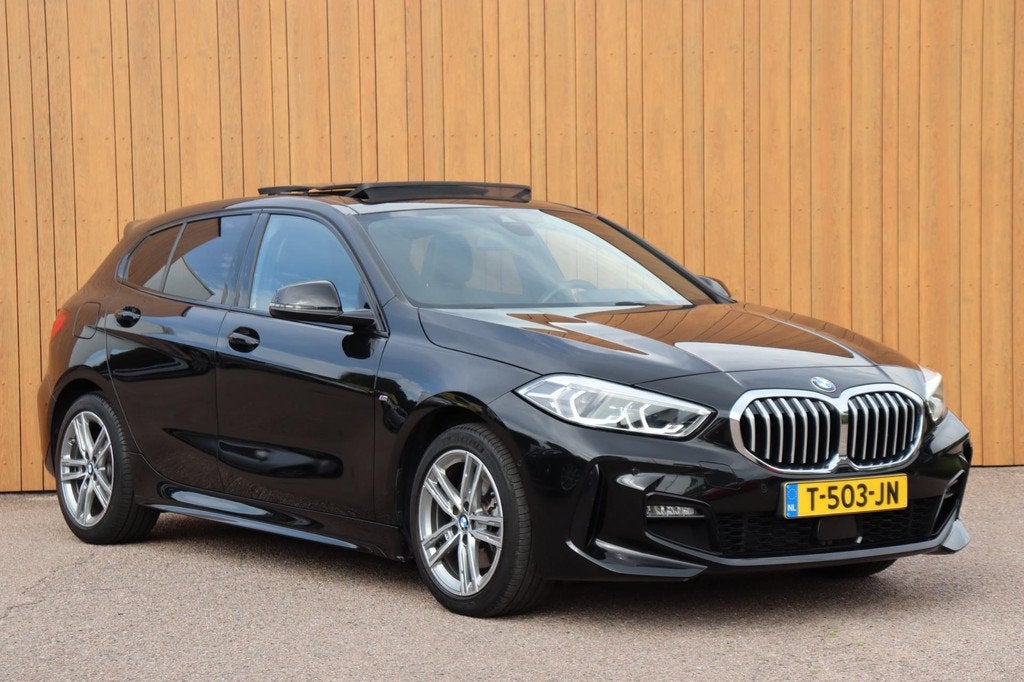 BMW 1-serie 116i Introduction Ed. M-sport orgNL Harman Kardo, 12 maanden, Gebruikt, Leder en Stof, Zwart